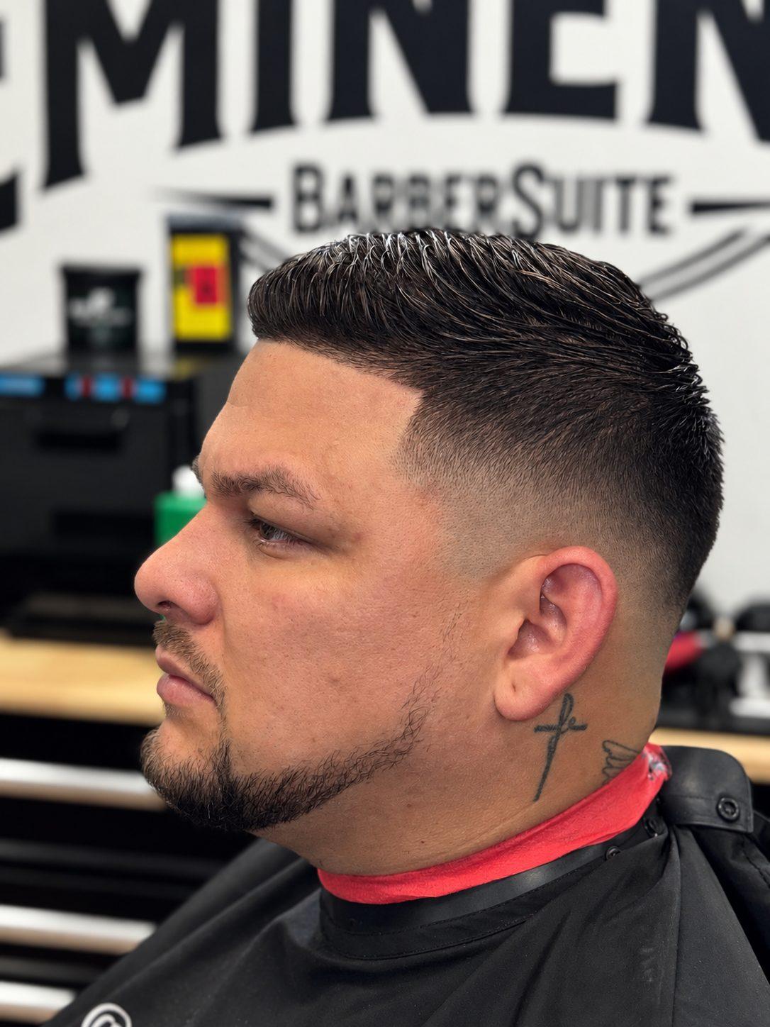 Mid skin fade comb over with beard at Eminence Barbersuite, North Plainfield NJ