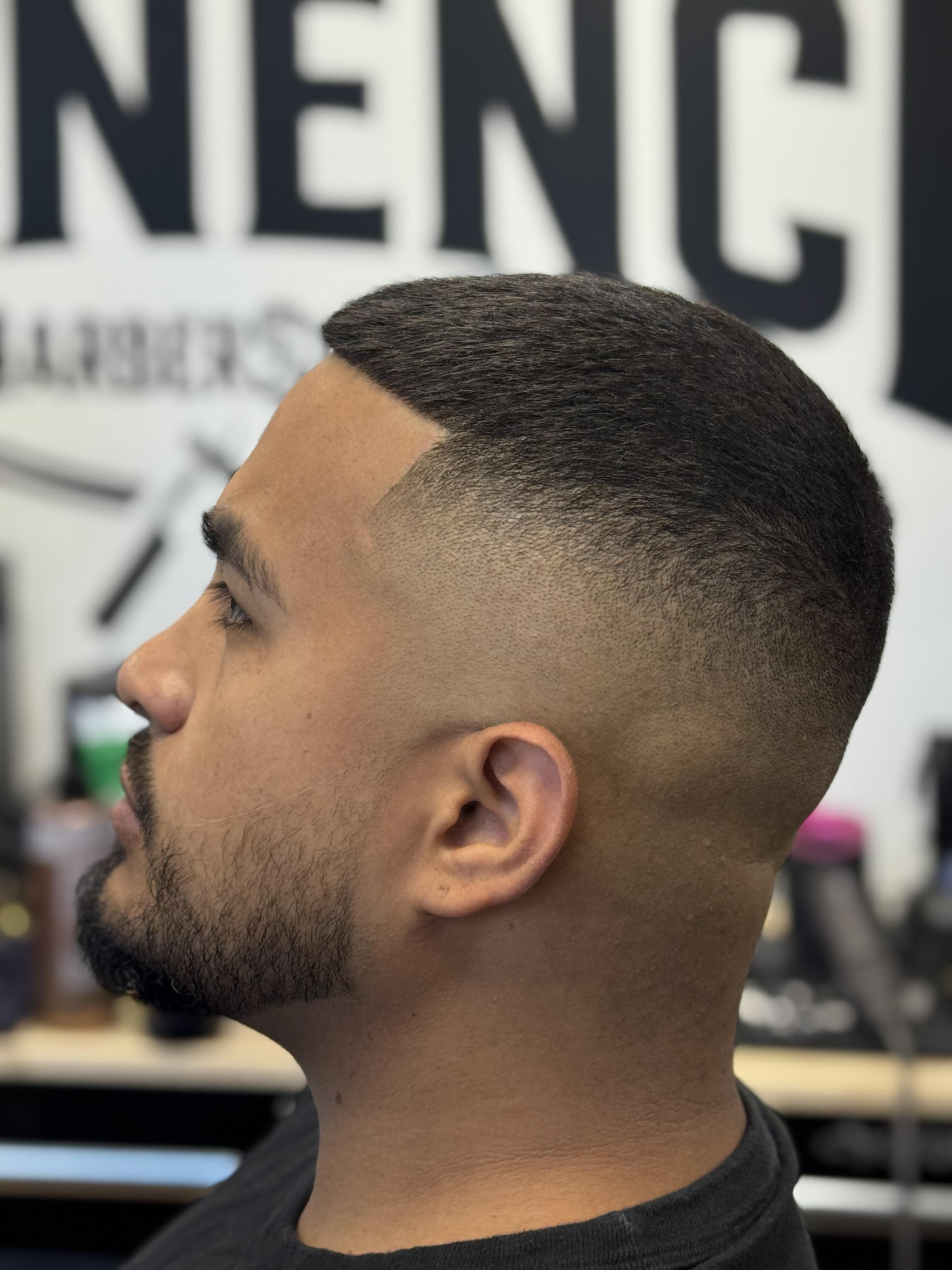 Skin fade with hard part at Eminence Barbersuite, North Plainfield NJ